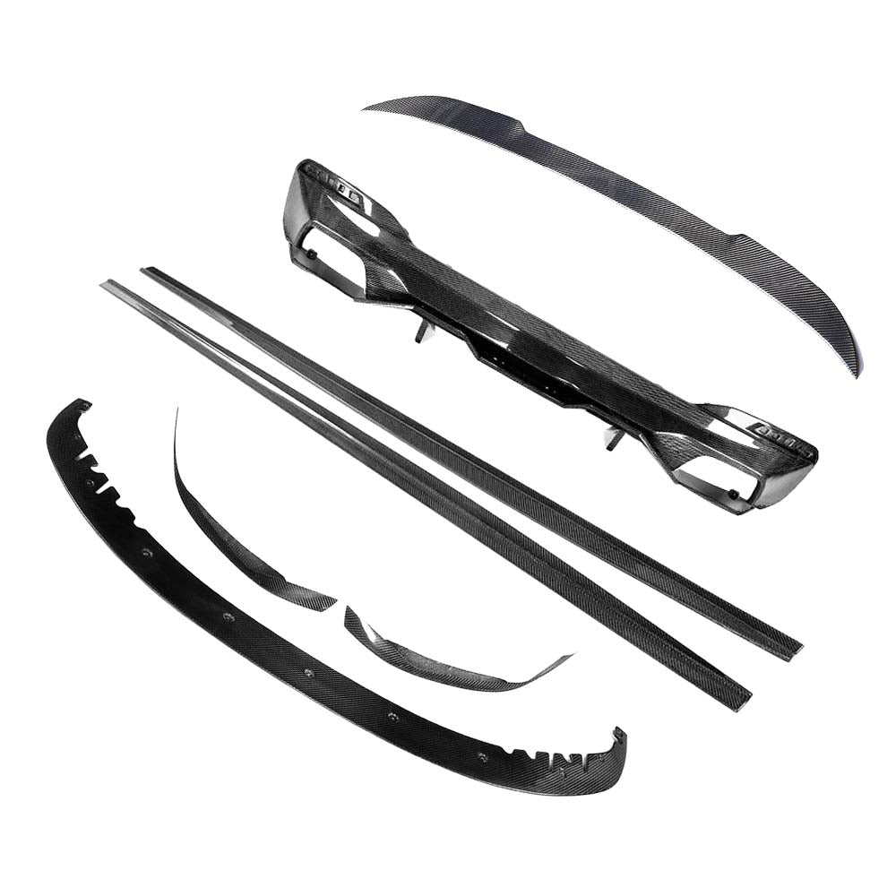 BMW-M5-F90-G30-5-SERIES-CARBON-FIBRE-SPOILER-DUCKTAIL-PS-STYLE_6efb1128-36dc-458a-80ef-5e7d17dc8c63jpg - OPSHOLDERS Set of carbon fiber automotive body kit parts displayed on a white background, including bumper lip, side skirts, and aero pieces for a car