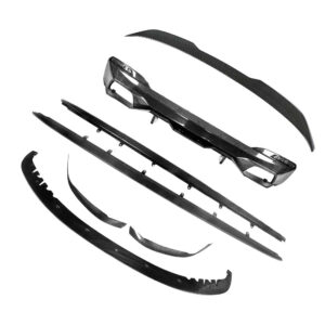 Set of carbon fiber aerodynamic body kit parts for a car, including front bumper lip, side skirts, and splitters on a white background.
