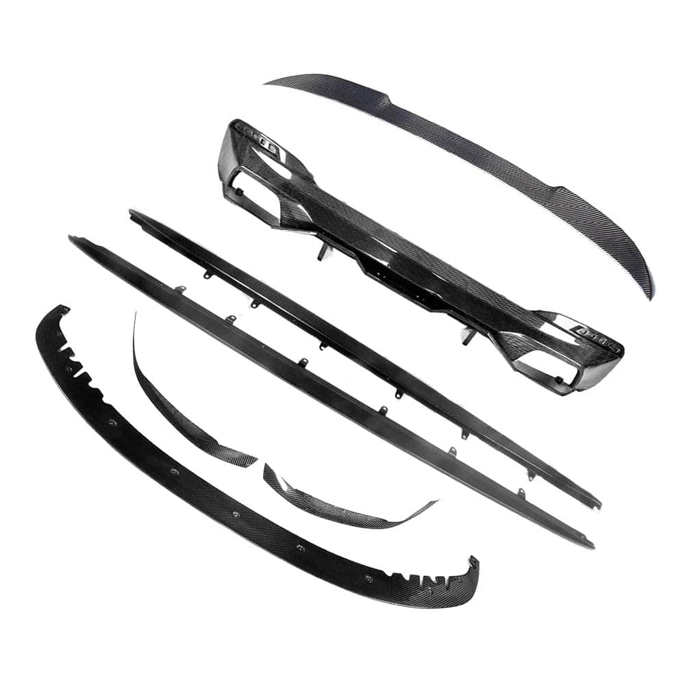 BMW-M5-F90-G30-5-SERIES-CARBON-FIBRE-SPOILER-DUCKTAIL-PS-STYLE_de9ca4e8-4b92-4bdc-b32f-89306a1a4e0djpg - OPSHOLDERS Assorted carbon fiber car body parts and trim pieces laid out on a white background.