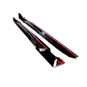Pair of black skis with red dotted stripes, angled diagonally against a white background, showing bindings near the bottom edge.