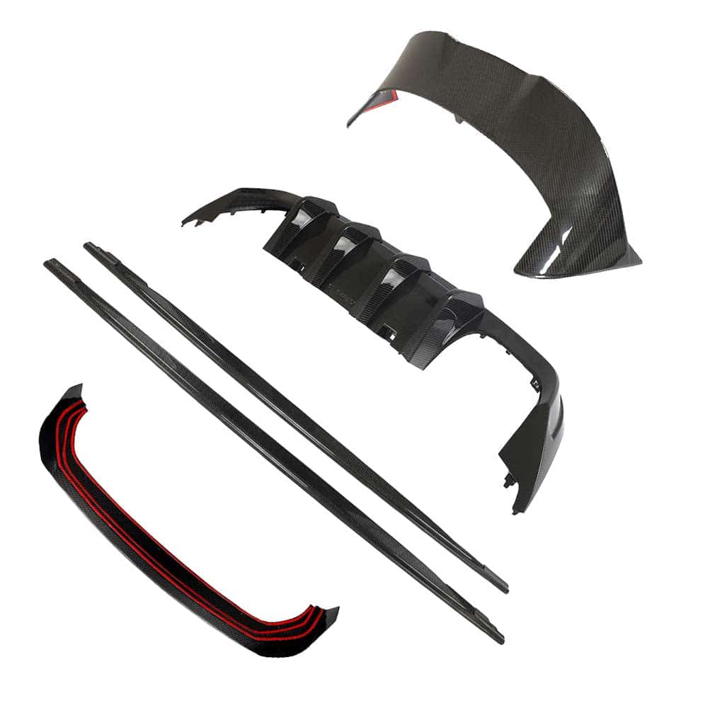 CCT5679_7jpg - OPSHOLDERS Carbon fiber car body kit parts laid out: front lip, side skirts, rear diffuser, and bumper pieces for a sports car exterior.