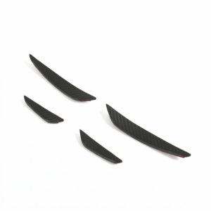 Several black carbon-fiber curved blades laid diagonally on a white background, with red tips visible on some ends.