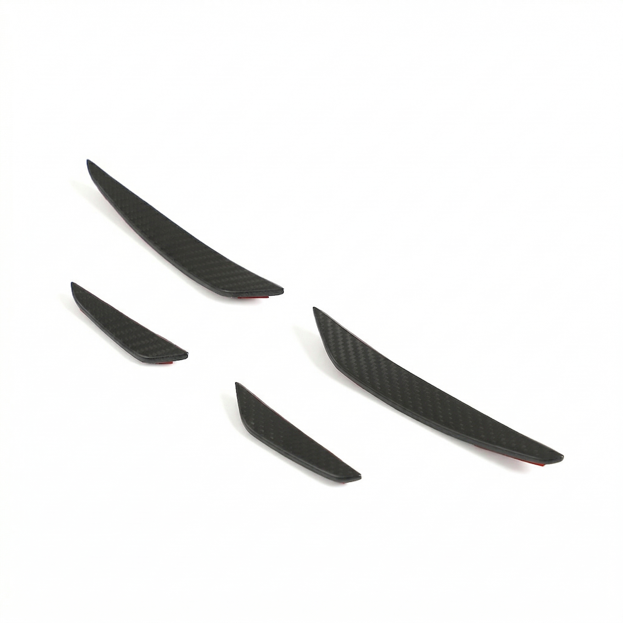 CT5926_Matte_CTCarbon_250326_04png - OPSHOLDERS Several black carbon-fiber curved blades laid diagonally on a white background, with red tips visible on some ends.