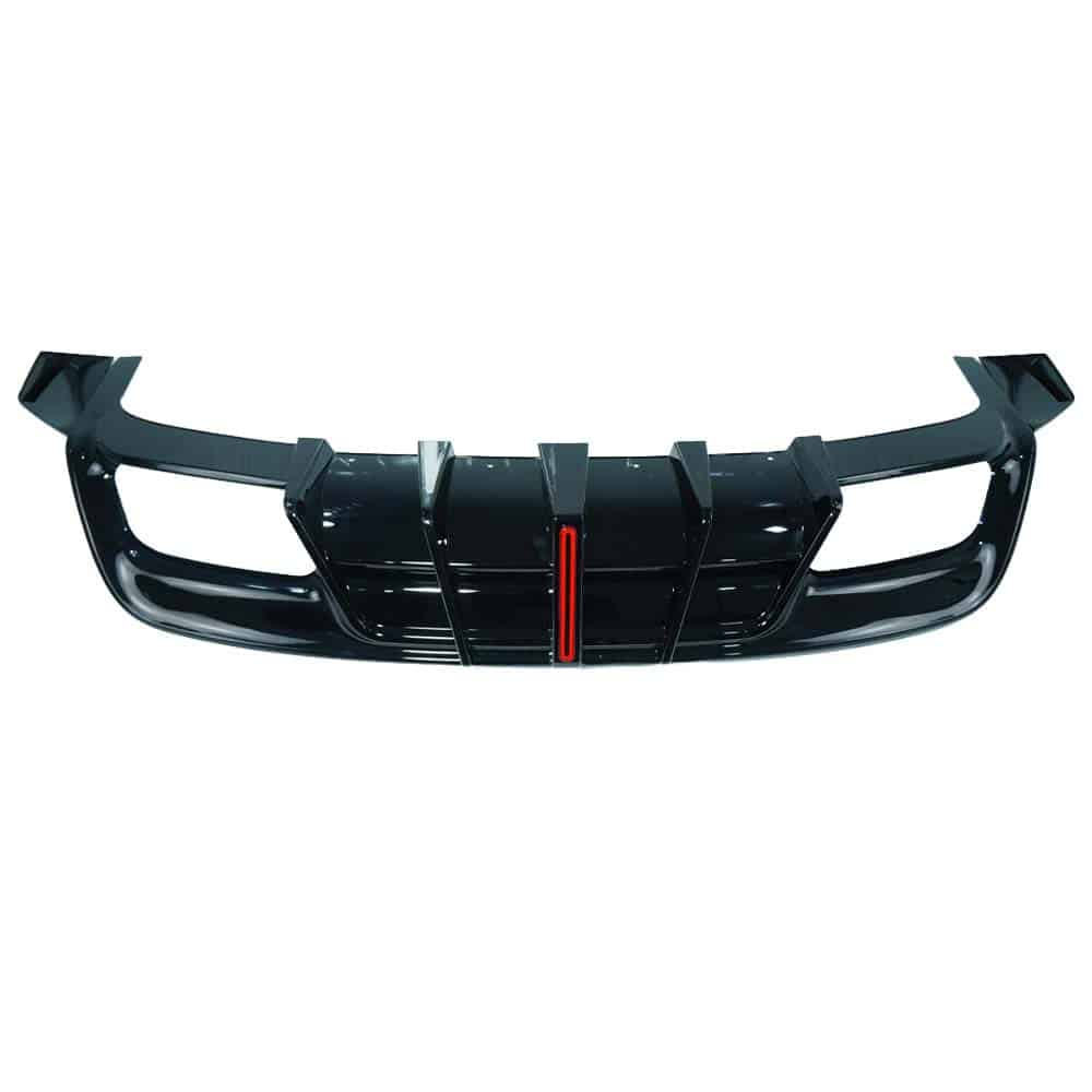 DSC07347jpg - OPSHOLDERS Front bumper grille of a black car with a red center accent.