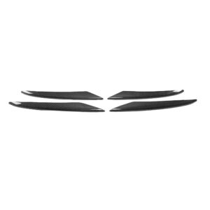 Set of four black carbon fiber car trim pieces, curved aerodynamic blades on a white background by themselves