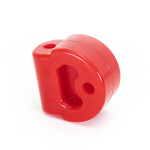 Red plastic two-hole pencil sharpener on a white background.