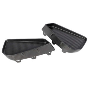 Pair of black carbon-fiber texture plastic trays with mounting tabs, likely automotive storage organizers to fit a vehicle's interior.