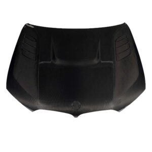 Black carbon-fiber car hood with integrated vents and sculpted contours, viewed from the front edge.