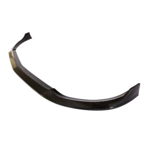 Curved carbon fiber car spoiler lip for aerodynamic enhancement in a vehicle.
