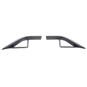 Pair of carbon fiber car aero fins facing outward, likely side air splitters for a vehicle's aerodynamics.