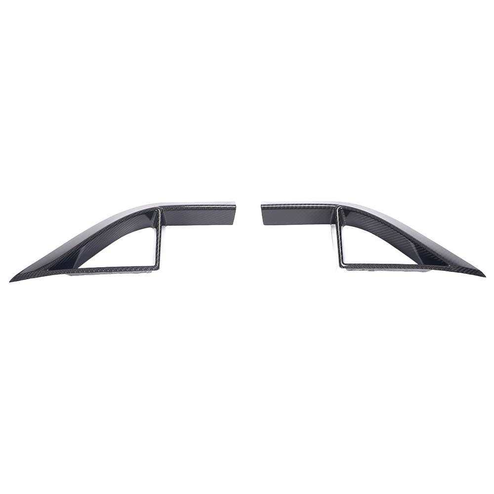 IMG_5369_1724b2e0-b1ef-4130-a32e-ded5e9b1fdc3jpg - OPSHOLDERS Pair of carbon fiber car aero fins facing outward, likely side air splitters for a vehicle's aerodynamics.