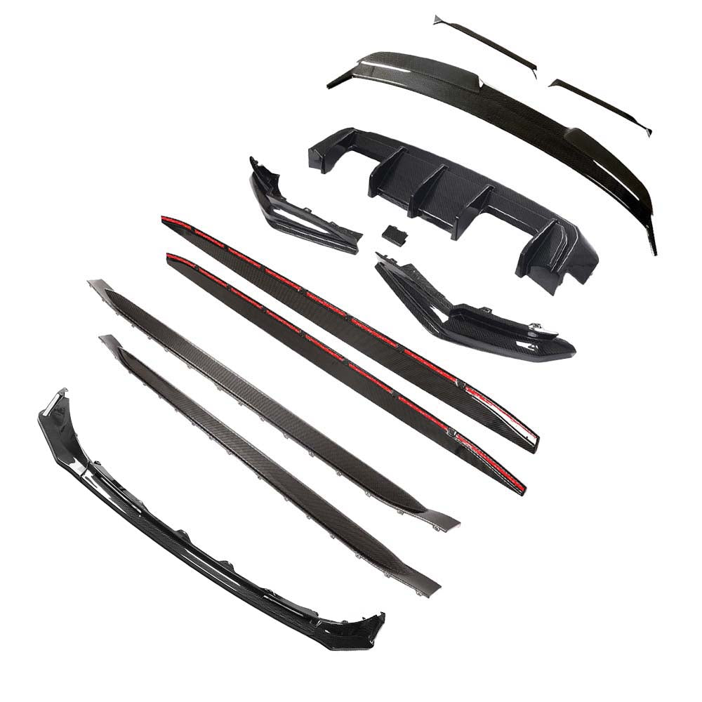 IMG_6577_1jpg - OPSHOLDERS Exploded view of a carbon fiber car body kit showing front lip, side skirts, rear diffuser, splitters, and mounting pieces laid out on a white background. Used for aftermarket exterior customization.