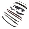 IMG_6577_877523d3-c0da-4b71-9cf1-22ceed8b87b7jpg - OPSHOLDERS Assorted carbon fiber car body kit parts (front lip, side skirts, diffusers) laid out on a white background.