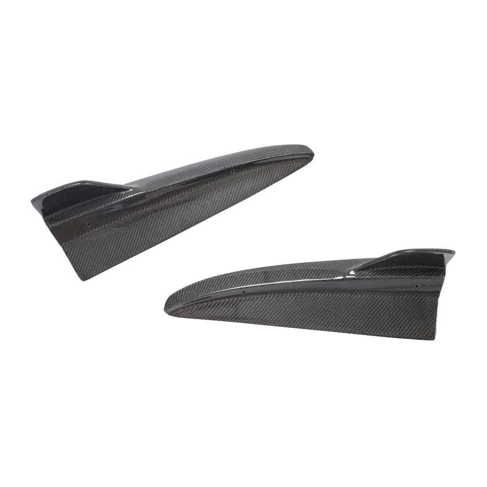 IMG_7598jpg - OPSHOLDERS Pair of black carbon fiber fins with curved, aerodynamic shapes shown against a white background, likely winglets for a high-performance watercraft or board.
