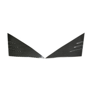 Two mirrored carbon-fiber aero panels with a diagonal weave, forming a V-shaped gap in the center on a white background with subtle slits on the inner edges.