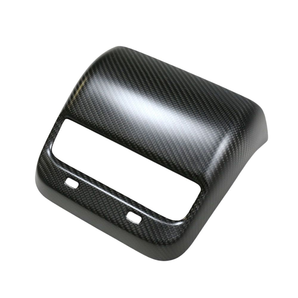 MAIN_1176a87c-3e68-455e-95e0-b97506422548jpg - OPSHOLDERS Carbon fiber–style car interior trim panel with a large rectangular opening and two small mounting holes, likely a dash/stereo bezel.
