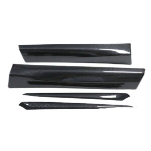 Four glossy carbon fiber car trim pieces arranged on a white background, in varying lengths and shapes.