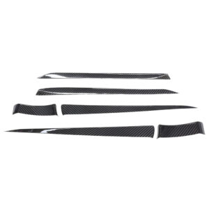 Set of carbon-fiber car trim pieces laid out in a row, curved and elongated decorative panels for exterior or interior use.