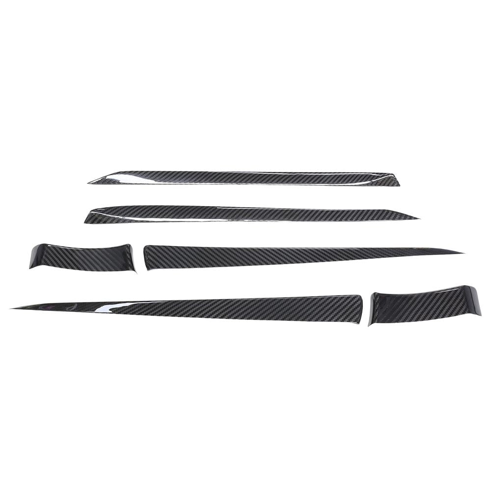 MAIN_57c3727b-baac-4f8f-bbeb-09b974683363jpg - OPSHOLDERS Set of carbon-fiber car trim pieces laid out in a row, curved and elongated decorative panels for exterior or interior use.