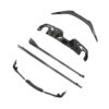 Disassembled carbon-fiber car bumper kit parts laid out on white background
