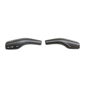 Pair of carbon-fiber car paddle shifters (left and right) for gear changing in a vehicle, shown with subtle white markings on each piece.