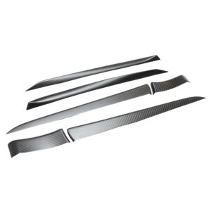 Set of four glossy carbon-fiber look trim strips arranged diagonally