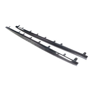 Three carbon fiber automotive trim strips with mounting tabs.