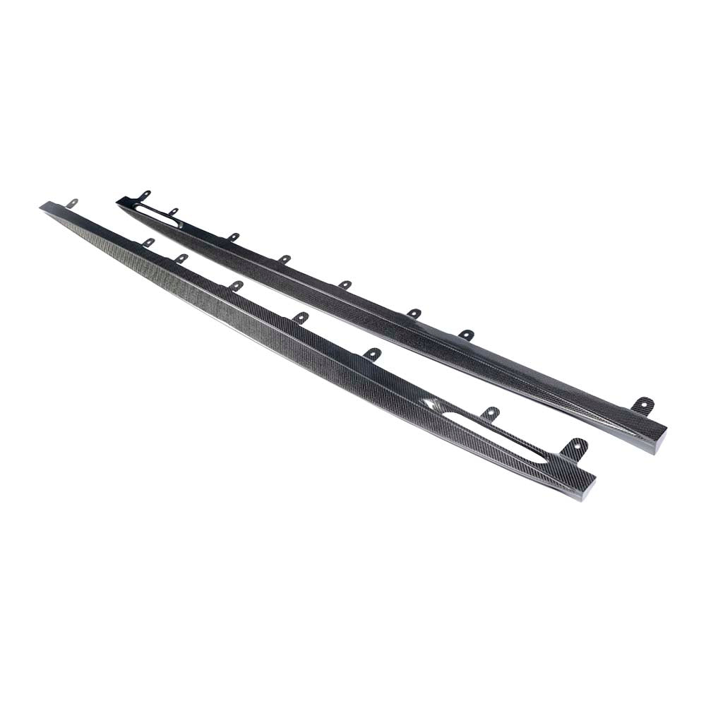 MG_3603jpg - OPSHOLDERS Three carbon fiber automotive trim strips with mounting tabs.