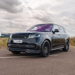 Black Range Rover SUV parked on a lot, purple-tinted windshield, front grille and CT CARBON plate visible