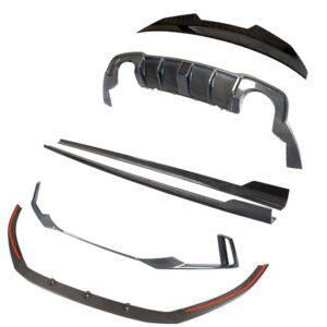 Carbon fiber car aero kit parts laid out on white background: front bumper lip, side skirts, rear diffuser, and wing elements for a sports car's body kit