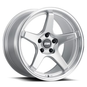 Silver five-spoke alloy car wheel/rim with a central hub and lug nut holes, branded center cap visible