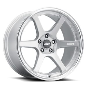 Silver five-spoke alloy car wheel with center cap and lug nut holes, angled to show depth and lip detail