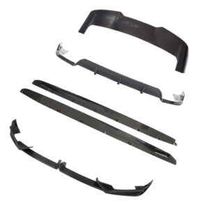 Set of carbon fiber car aero parts: front splitter, side skirts, rear diffuser, and bumper lip Kit pieces shown separately in black finish
