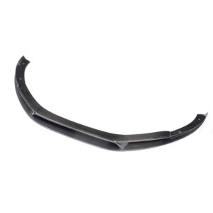 Carbon fiber car front lip spoiler with mounting holes, a curved aerodynamic bumper accessory lengthwise.