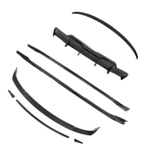 Disassembled windshield wiper blades and parts laid out on a white background.