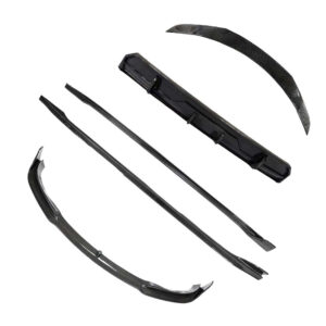 Disassembled windshield wiper blades and blades components laid out on a white background (car maintenance parts)