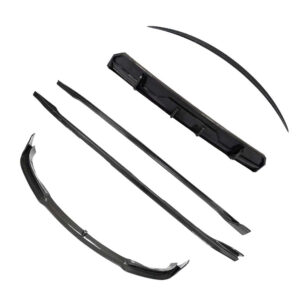 Disassembled windshield wiper blades laid out, showing blades and connecting parts for a car windshield wiper system.