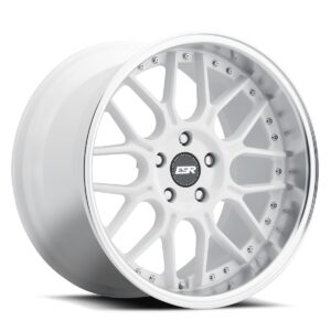 White multi-spoke alloy wheel with a polished lip and center cap badge in the middle.