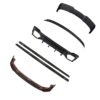 Set of black carbon-fiber bicycle parts with curved strips and a frame piece on a white background, arranged diagonally.