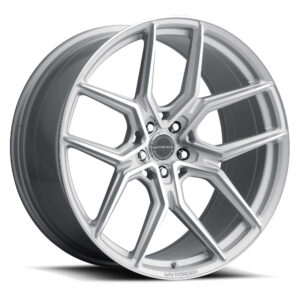 Close-up of a silver alloy wheel with multiple spokes and a central lug-nut hubcap visible at the center.
