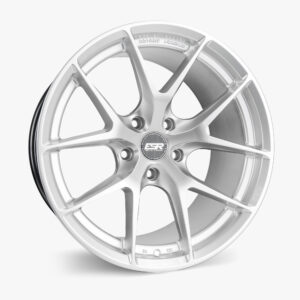 Close-up of a silver rotary-forged alloy wheel with multiple spokes and lug nut holes.