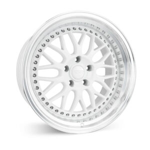 White multi-spoke alloy car wheel with a chrome outer rim and small embedded rivet-like studs