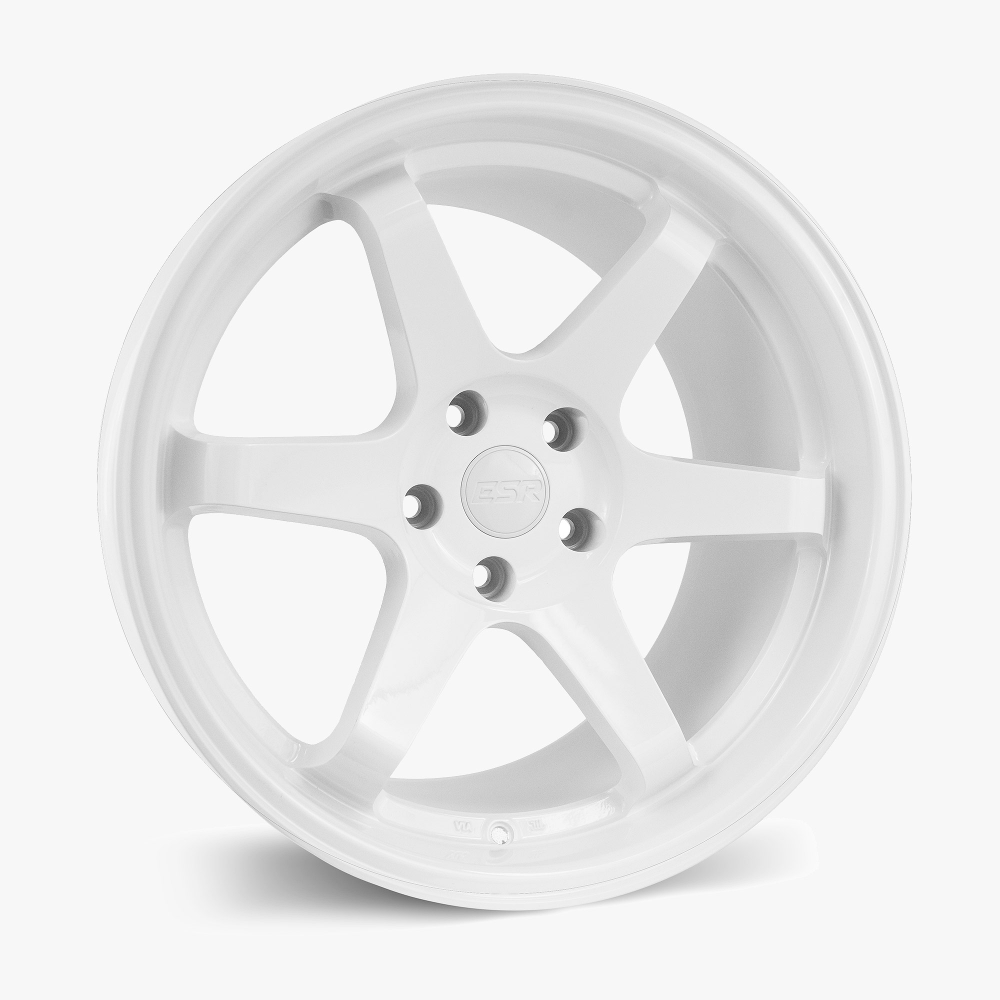 sr07-gloss-whitejpg - OPSHOLDERS Close-up of a white alloy wheel rim with five spokes and lug holes, viewed at an angle against a light background.