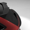 t10jpg - OPSHOLDERS Close-up of a red sports car’s rear window area with a black wiper and carbon-fiber spoiler against a gray background.