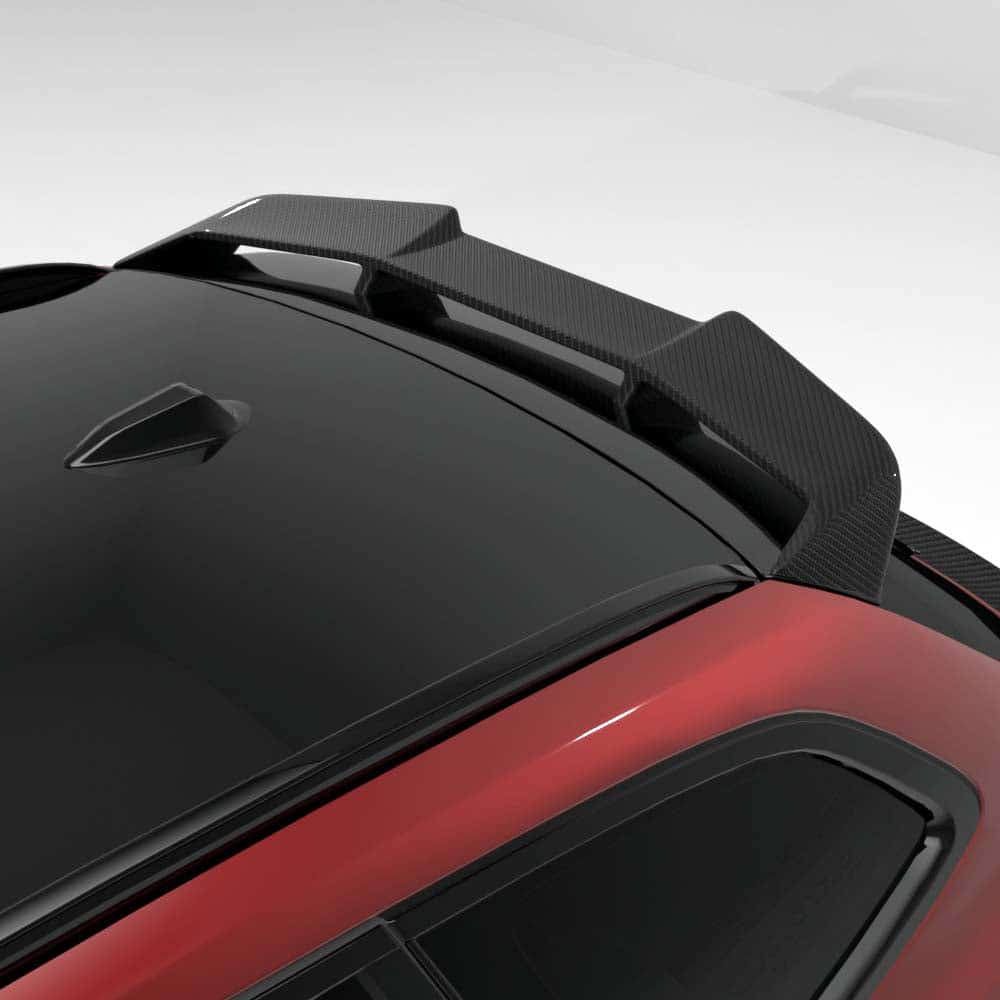 t9jpg - OPSHOLDERS Sports car roof with a carbon fiber rear wing spoiler and glossy black roof, red body panels visible.