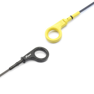 10-14-tsi-billet-dipstick_53399698121_o-scaled-1jpg - OPSHOLDERS Close-up of a yellow loop handle attached to a thin dark rod, with a black circular component nearby on a white background