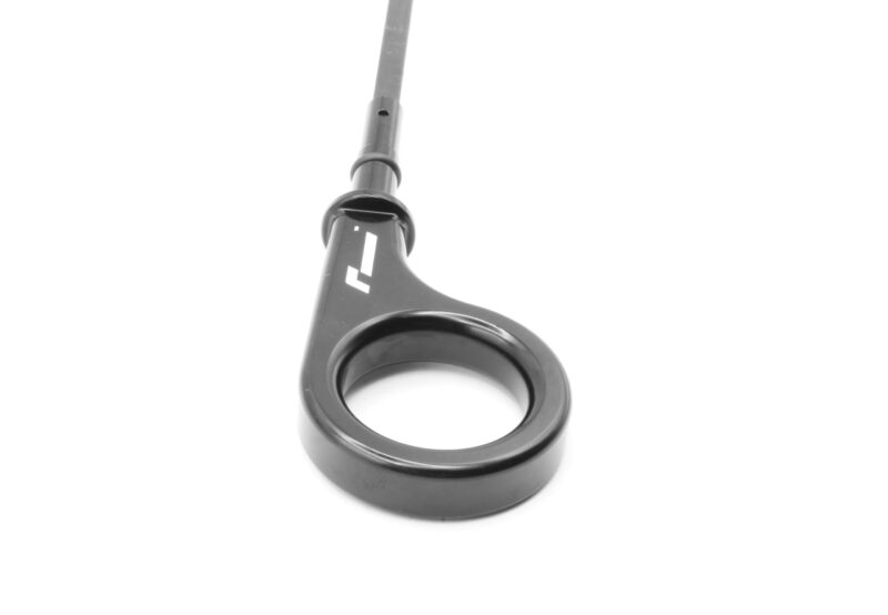 10-14-tsi-billet-dipstick_53400021149_o-scaled-1jpg - OPSHOLDERS Close-up of a medical instrument with a circular ring grip and a slender metallic shaft extending upward.
