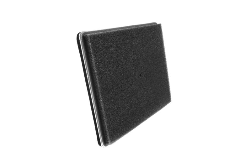 Close-up of a black foam windscreen on a microphone, showing its textured surface and metal rim