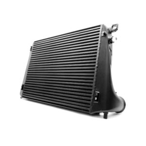 Angled close-up of a vehicle radiator with ribbed core and side tanks, showing mounting brackets and fittings on the right edge.