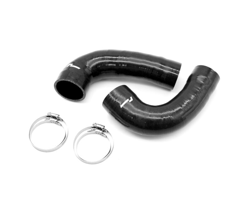 Close-up of black curved silicone hoses and silver metal bracelets on a white background.